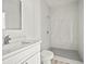 Beautiful bathroom featuring a marble tiled shower and sleek vanity at 610 E Euclid Ave, Deland, FL 32724