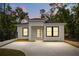 Charming one-story home with modern design elements and freshly paved driveway at 610 E Euclid Ave, Deland, FL 32724