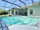 Sparkling in-ground pool with an outdoor deck area for entertaining Gathering and friends at 671 Carey Way, Orlando, FL 32825