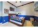 This room features a bed and office area, with a ceiling fan and crown molding at 714 Regina Cir, Oakland, FL 34787