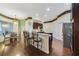 Kitchen with island, stainless appliances, and bar seating at 714 Regina Cir, Oakland, FL 34787