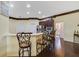Open kitchen featuring stainless steel appliances and a breakfast bar at 714 Regina Cir, Oakland, FL 34787