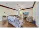 Comfortable living room with hardwood floors, ceiling fan, and a large sectional couch at 714 Regina Cir, Oakland, FL 34787