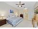 Bright main bedroom with walk-in closet and ensuite bathroom at 714 Regina Cir, Oakland, FL 34787