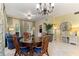 Cozy living room boasts tile flooring, elegant lighting, and well-appointed furnishings at 7509 Mourning Dove Cir # 201, Reunion, FL 34747