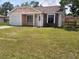 Charming single-story home with brick accents and a well-maintained front yard at 8750 Se 88Th Ave, Ocala, FL 34472
