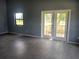 Spacious living room with tile floors and natural light at 8750 Se 88Th Ave, Ocala, FL 34472