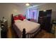 Cozy bedroom with a comfortable bed, dresser, and ceiling fan, perfect for relaxation at 101 Grand Junction Blvd, Orlando, FL 32835