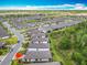 Home indicated with red arrow in community aerial view at 1029 Umbria Dr, Poinciana, FL 34759