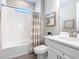 Clean bathroom features a single sink, shower, and tub at 1029 Umbria Dr, Poinciana, FL 34759