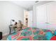 Bedroom includes a desk and chair at 1029 Umbria Dr, Poinciana, FL 34759
