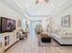Spacious open concept living room flows seamlessly into the dining and kitchen areas at 1029 Umbria Dr, Poinciana, FL 34759