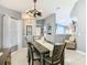 Dining area features stylish decor, tile flooring, and easy access to the living spaces at 112 Grand Canal Dr, Poinciana, FL 34759