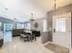 Spacious floor plan showcases the dining area and living room with tile floors throughout at 112 Grand Canal Dr, Poinciana, FL 34759