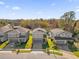 An aerial view of the homes in the community with mature landscaping and trees at 1251 Ash Tree Cv, Casselberry, FL 32707
