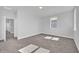 Inviting bedroom with plush carpet, neutral paint, and ample natural light at 1251 Ash Tree Cv, Casselberry, FL 32707