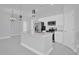 Modern kitchen with an island, stainless steel appliances, and stylish pendant lighting at 1251 Ash Tree Cv, Casselberry, FL 32707