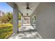 This home features a covered patio with dual ceiling fans at 1251 Ash Tree Cv, Casselberry, FL 32707