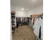 Spacious walk-in closet with ample storage for clothes and accessories at 19235 Allium Pl, Orlando, FL 32827