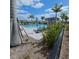 Large community pool with lounge chairs and umbrellas at 19235 Allium Pl, Orlando, FL 32827