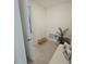 Flex room with neutral paint and wood look flooring, perfect for home office or playroom at 19235 Allium Pl, Orlando, FL 32827