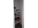 Linen closet with wire shelves for storage of sheets, towels, and other items at 19235 Allium Pl, Orlando, FL 32827
