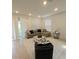 Comfortable living room featuring neutral tones, plush seating, and natural light at 19235 Allium Pl, Orlando, FL 32827