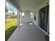 View of a large covered patio with recessed lighting, perfect for entertaining at 19235 Allium Pl, Orlando, FL 32827