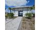 Pool entrance with gated access and a paved walkway at 19235 Allium Pl, Orlando, FL 32827