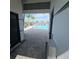 View of a community pool with palm trees and lounge chairs at 19235 Allium Pl, Orlando, FL 32827