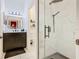 Beautiful bathroom featuring a glass-enclosed shower with marble tile and a modern vanity at 207 Bailey Cir, Davenport, FL 33897