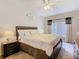 Bedroom with decor, large window, and plush bed at 207 Bailey Cir, Davenport, FL 33897