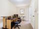 Office space featuring neutral walls, carpet and a small desk and chair at 207 Bailey Cir, Davenport, FL 33897
