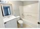 Bathroom featuring a bathtub-shower combination, and a white vanity sink at 2213 Metropolitan Way # 1318, Orlando, FL 32839