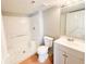 Bathroom featuring a shower stall, white vanity sink, and updated finishes at 2213 Metropolitan Way # 1318, Orlando, FL 32839