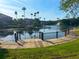 Picturesque pond with walkway and fountain in a beautiful apartment community at 2213 Metropolitan Way # 1318, Orlando, FL 32839