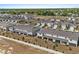 Spacious townhomes with a beautiful community view, manicured landscaping, and neutral color palettes at 2302 Tay Wes Dr, St Cloud, FL 34771
