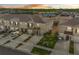 An aerial view shows the townhome's proximity to a tranquil pond, providing a serene backdrop at 2302 Tay Wes Dr, St Cloud, FL 34771