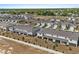 An aerial view of a Thompson Grove neighborhood with modern homes and community park at 2302 Tay Wes Dr, St Cloud, FL 34771
