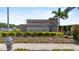 Thompson Grove monument sign with manicured landscaping and a fire hydrant at 2302 Tay Wes Dr, St Cloud, FL 34771