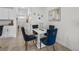 Dining area with modern table set, decor, and view to entry at 2302 Tay Wes Dr, St Cloud, FL 34771