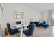 Elegant dining area with a chic table setting and an adjacent sitting area at 2302 Tay Wes Dr, St Cloud, FL 34771