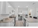 Modern kitchen featuring stainless appliances, an island sink and counter space at 2302 Tay Wes Dr, St Cloud, FL 34771
