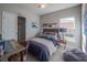 Bedroom featuring a full bed, closet and accents including oars and boat painting at 248 Cheshire Ct, Kissimmee, FL 34758