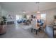 Open living area featuring tile floors, recessed lighting and sliding glass doors to the backyard at 248 Cheshire Ct, Kissimmee, FL 34758