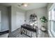 Bright office space with a modern desk, shelving, and a comfortable chair at 248 Cheshire Ct, Kissimmee, FL 34758