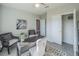 Well-lit office area with a stylish desk, decorative accents, and seating at 248 Cheshire Ct, Kissimmee, FL 34758