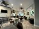 A comfortable lounge and bar area with varied seating and overhead fans at 2788 Sun Key Pl, Kissimmee, FL 34747