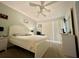 Comfortable bedroom with neutral tones, a ceiling fan and bright, natural lighting at 2788 Sun Key Pl, Kissimmee, FL 34747