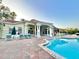 Resort-style pool with a bar area and lounge seating for ultimate relaxation at 2788 Sun Key Pl, Kissimmee, FL 34747